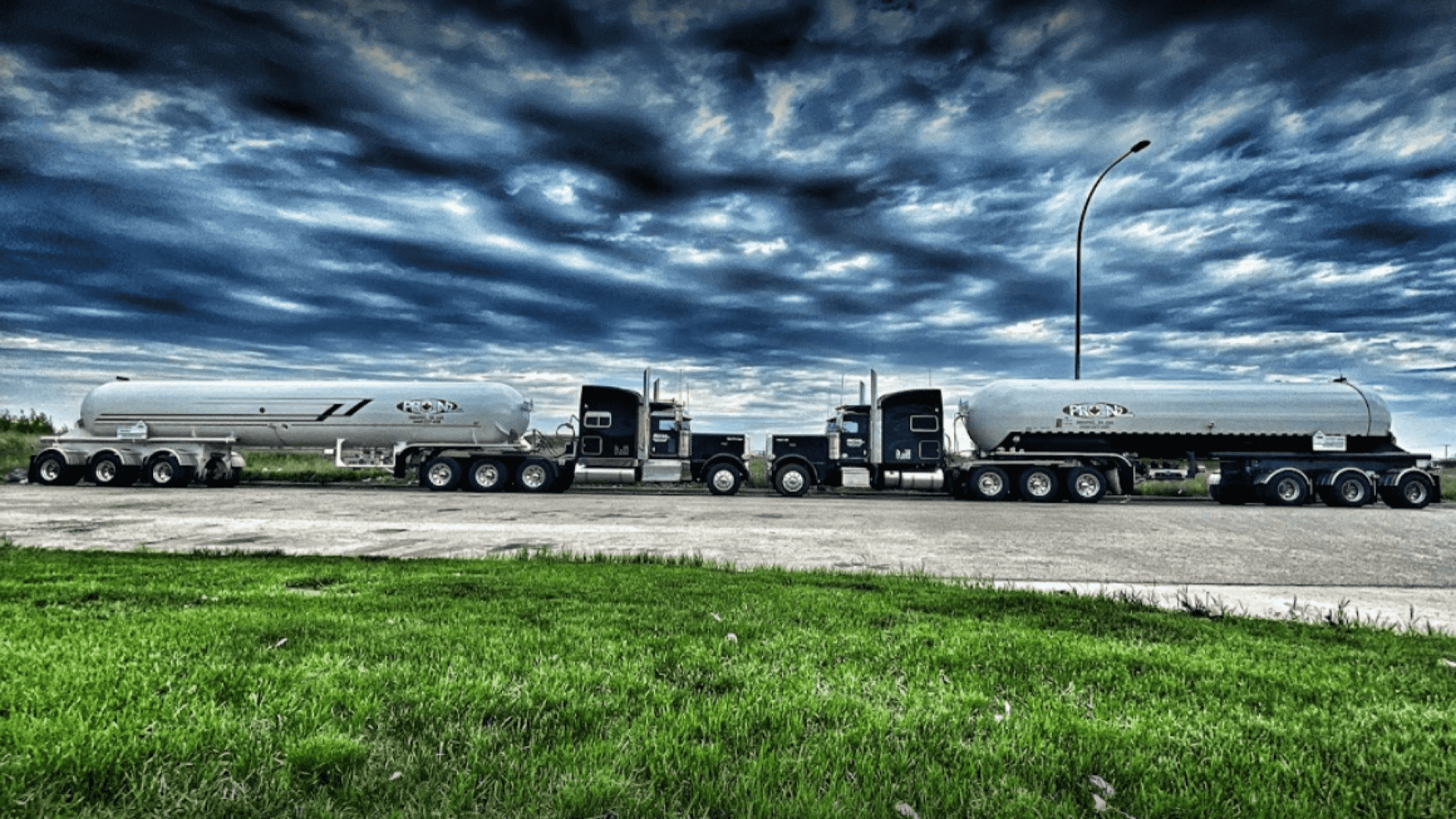 Two ProN2 trucks hauling nitrogen facing each other